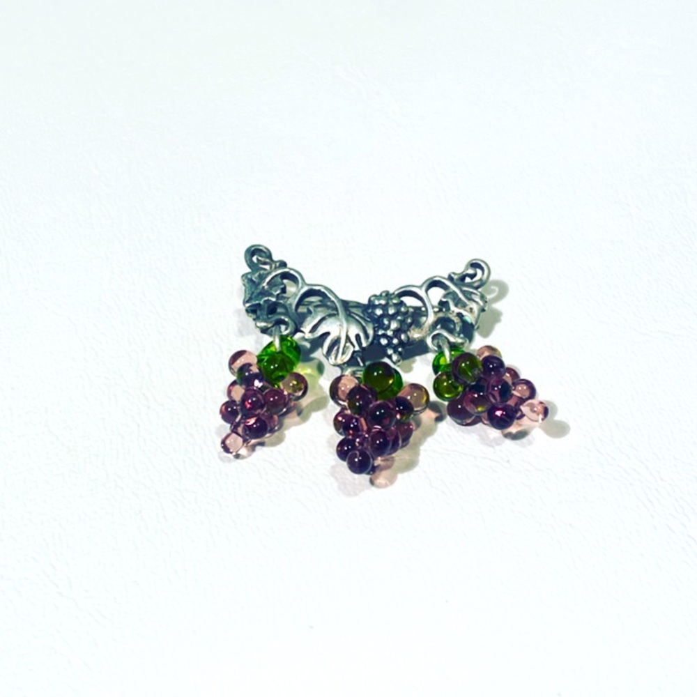 Sterling silver grape vine pin.